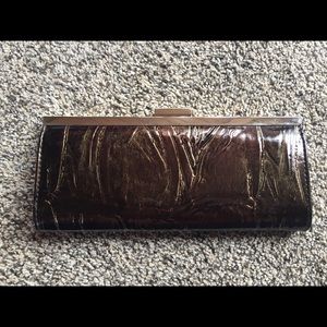 Metallic green clutch